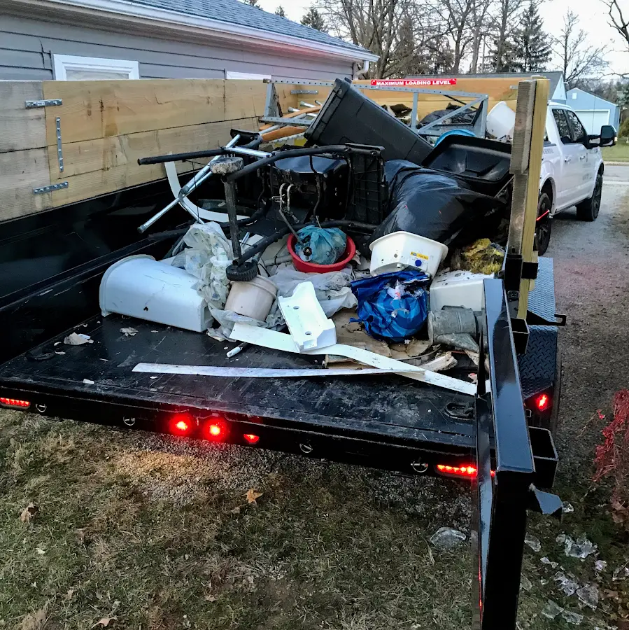 Roll-off dumpster delivered to a residential driveway in Canisteo